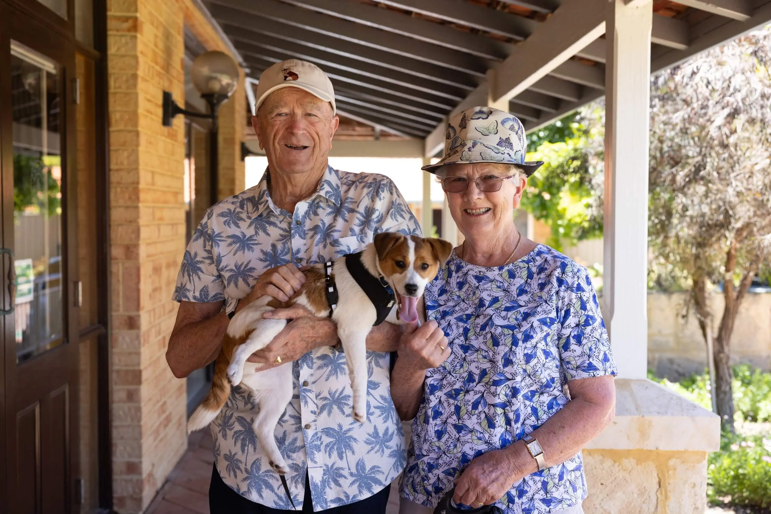 Retired couple holding dog | St Ives