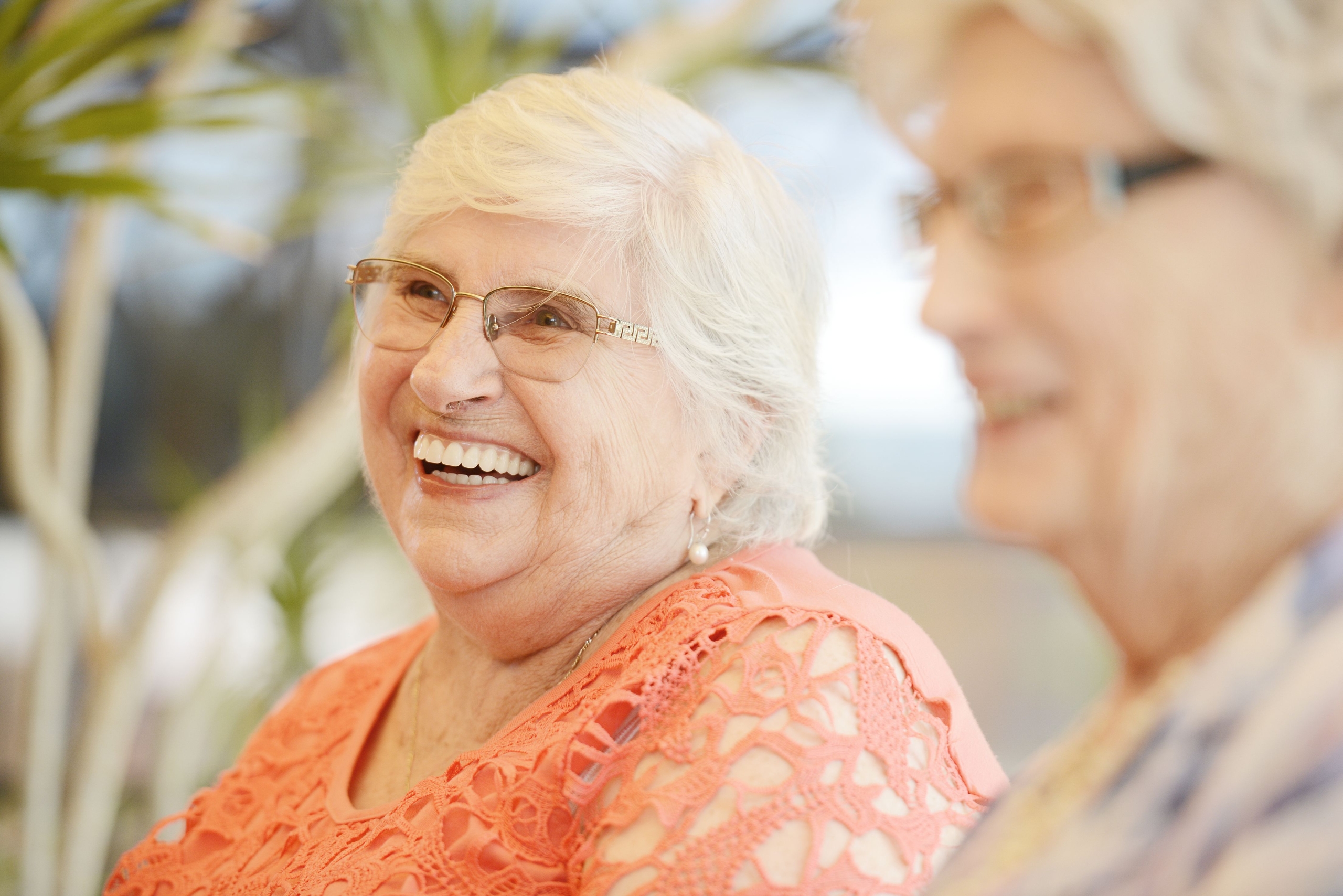 elderly woman laughing